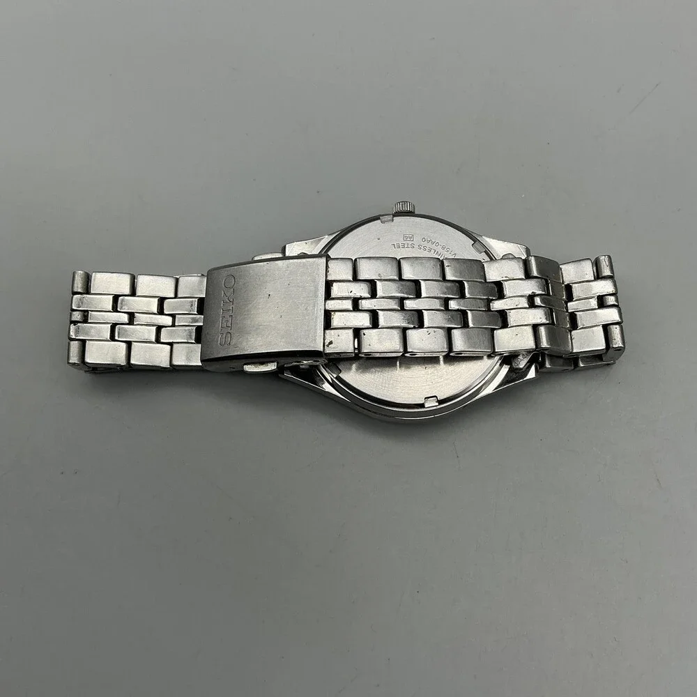 Seiko Mens Watch 37mm White Dial Solar V158-0AA0 Day Date Stainless Steel 7.5